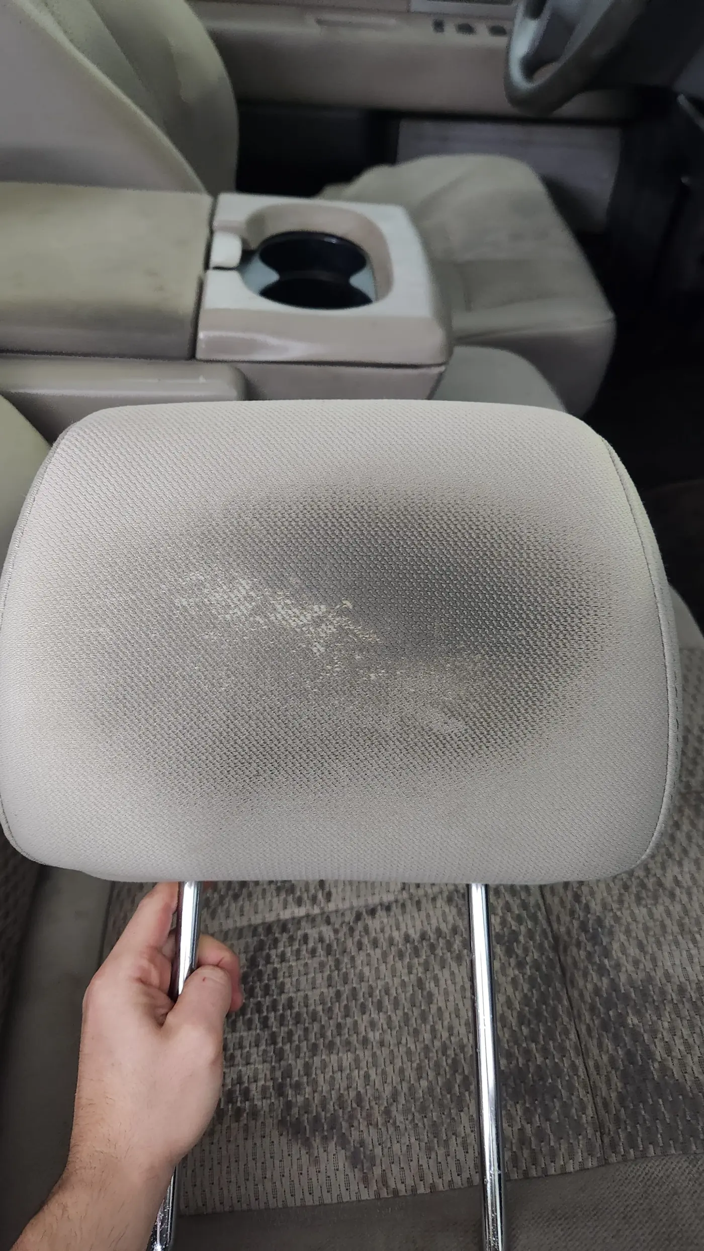 Stained headrest before cleaning
